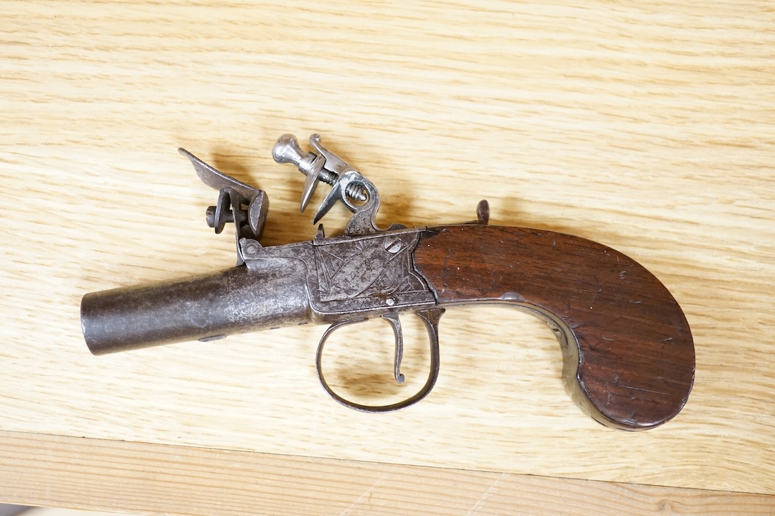 A boxlock flintlock pocket pistol with turn off barrel, Birmingham proved, frame engraved; Salmon and co., sliding safety catch